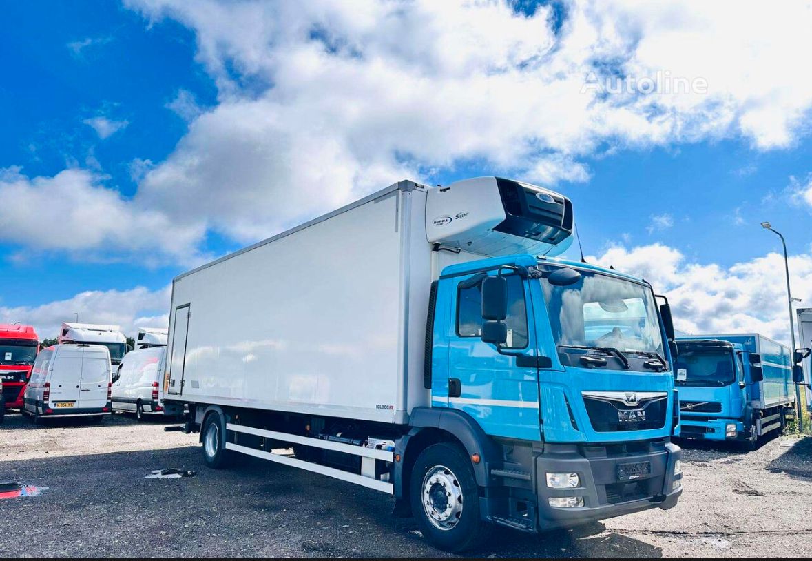 Heavy refrigerated truck with insulated box and roof cooling unit ready for cold transport
